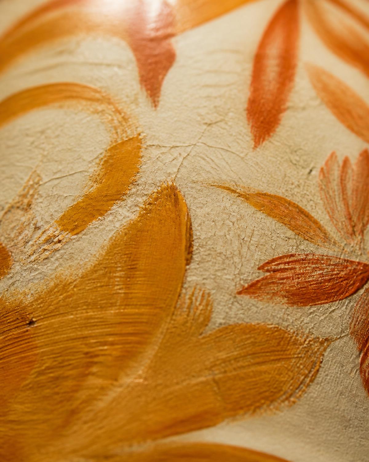 Macro detail of ochre and terracotta brushwork